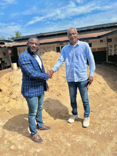 The visiting team at the future renovation site