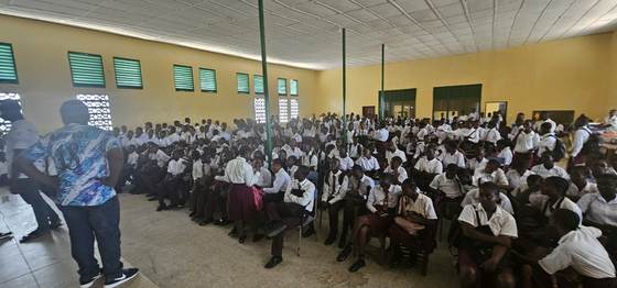 Addressing a school assembly