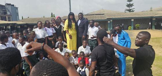 Students gather for a photograph after the visit
